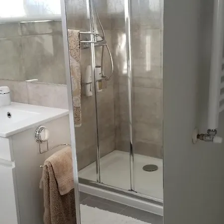 Quarto em Acomodações Particulares Casa Da Praia *